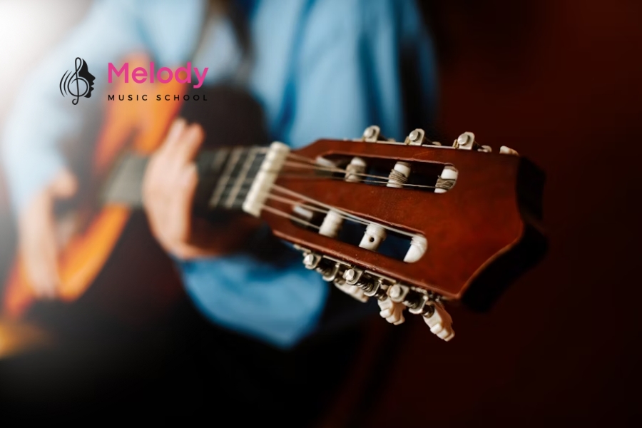 Địa Điểm Học Đàn Guitar Ba Đình Uy Tín Chất Lượng 3 Chơi đàn guitar giúp phát triển trí não, tăng tập trung và rèn luyện kỹ năng vận động