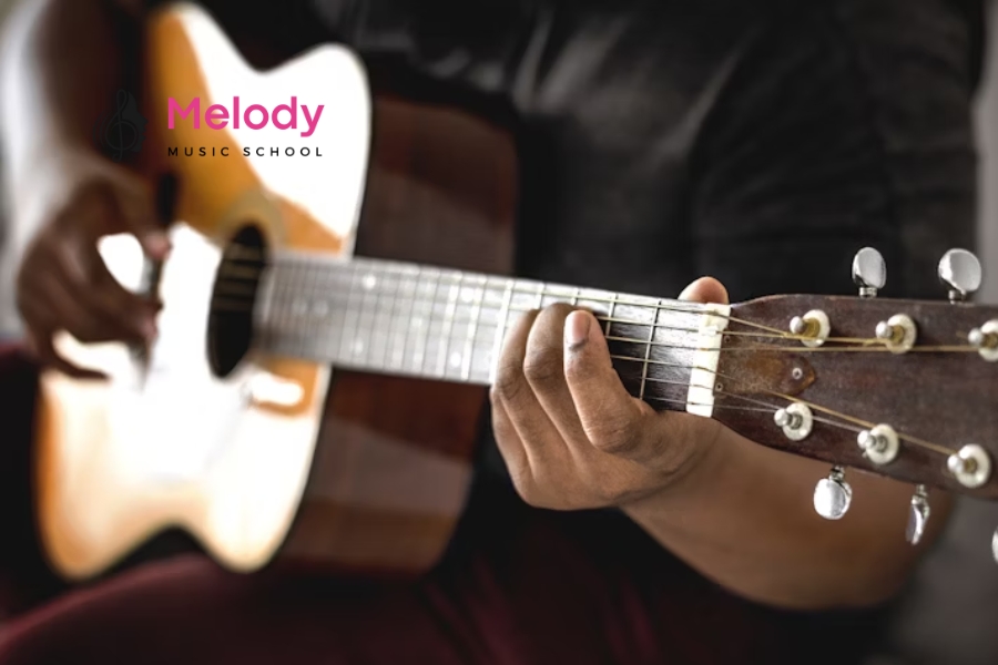 Địa Điểm Học Đàn Guitar Tây Hồ Uy Tín Chất Lượng 3 Chơi đàn guitar giúp phát triển âm nhạc, tăng tập trung, giảm stress và tự tin hơn