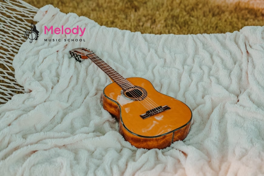 Bí Quyết Chọn Guitar Phù Hợp Cho Người Tay Nhỏ 13 Người tay nhỏ vẫn chơi guitar tốt nếu chọn đàn phù hợp và luyện đúng cách