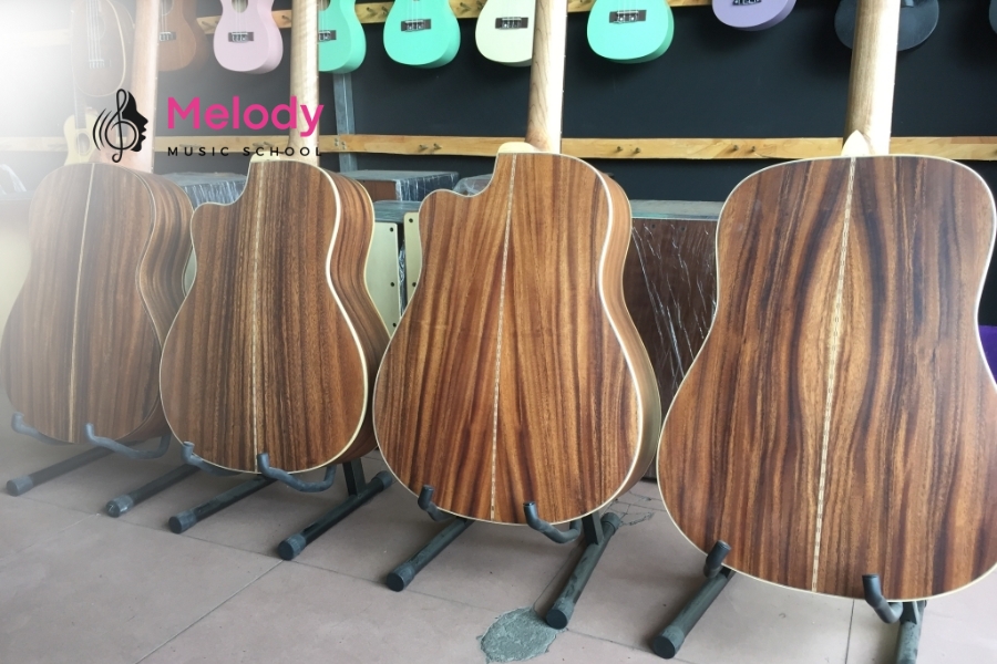 Guitar Gỗ Nguyên Khối Hay Gỗ Ép: Nên Chọn Loại Nào? 9 Mua guitar gỗ nguyên khối, gỗ ép và kết hợp tuỳ theo nhu cầu người chơi