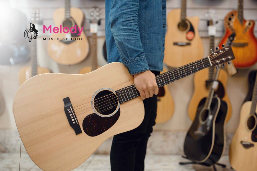 Guitar Gỗ Nguyên Khối Hay Gỗ Ép: Nên Chọn Loại Nào? 13 Người mới nên chọn đàn gỗ ép tốt, nâng cấp sau khi học vững kỹ thuật