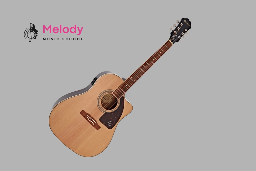 Phân Biệt Các Loại Guitar Acoustic: Hướng Dẫn Chi Tiết 12 Guitar dáng concert âm cân bằng, hợp fingerpicking và người tay nhỏ chơi kỹ thuật
